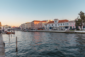 Canals of the city aveiro in colorful sunset Portugal