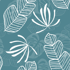 Tropical seamless pattern with leaves. White tropical leaves on blue background. Banana leaves, monstera leaves, palm leaves.