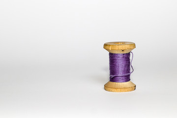 purple vintage thread on white background