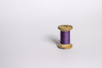 purple vintage thread on white background