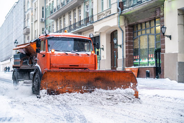 snow remove machine with crew in the streets b