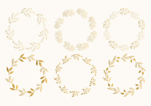 Gold floral round frames. Glitter wreath design. Vector. Isolated.