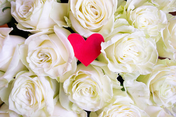 Roses flower bouquet with red heart