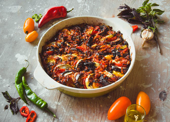 Ratatouille - traditional French vegetable dish cooked in oven. Diet vegetarian vegan food -...