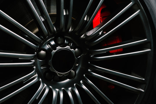 Fototapeta Car detailing series: Clean luxury car wheel