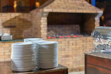 stone oven in the restaurant. Outdoor restaurant with stone stove. Brick oven for baking bread. A traditional oven for cooking and baking pizza and bread.