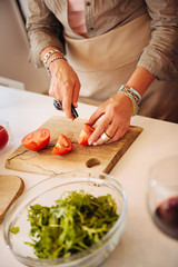 Close up of tomatoes lying on the cutting board