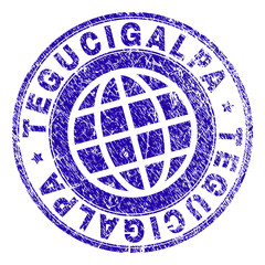 TEGUCIGALPA stamp imprint with grunge texture. Blue vector rubber seal imprint of TEGUCIGALPA label with unclean texture. Seal has words placed by circle and planet symbol.