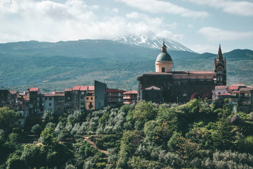 Old village in Sicily with a panoramic view of Volcano Etna