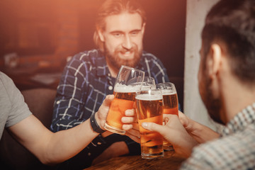 Glass of crafting beer in bar. Concept meeting of friends