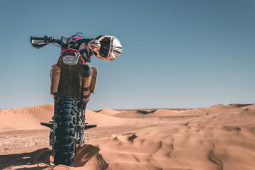 Amazing experience in the Sahara Desert with enduro motorbike, off road travel adventure - obrazy, fototapety, plakaty