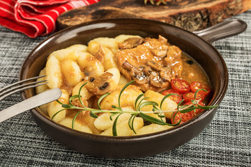 Braised pork chop with mushrooms.