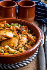 Fried chicken fillet with vegetables.