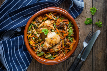Fried chicken pieces with vegetables.
