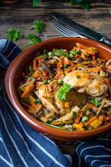 Fried chicken fillet with vegetables.