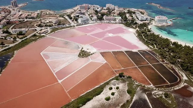 Colonia Sant Jordi, Mallorca Spain. Amazing drone aerial landscape of the village, the pink salt flats and the charming beach Estanys