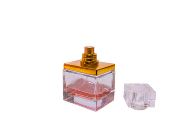 Perfume bottle with open lid on white isolated background