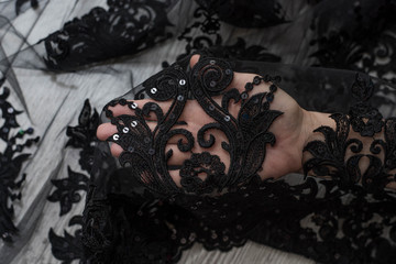 The texture of lace on wooden background