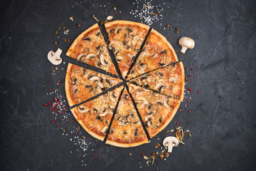 Italian pizza isolated on black background