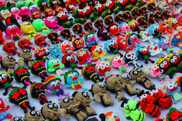 small handmade multicolored wool puppets with big eyes, keychain