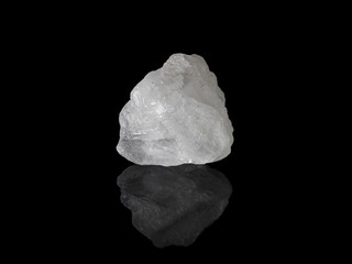 White Alum crystal isolated on black background