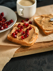 sandwich, pomegranate, peanut butter (sweet snack). Top Food background