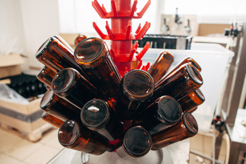 Close-up of a rack for beer bottles at a brewery