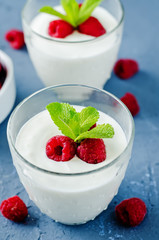 Greek yougurt with fresh raspberries and mint