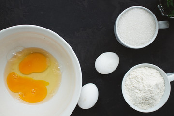 raw dough and apples (eggs, flour and other ingredients apples - Charlotte). food background. copy space