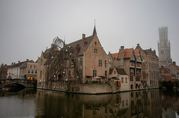 Fototapeta na wymiar View from the boat, of the historical building on the sides of canal at Bruges 