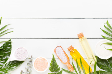 Beauty and fashion concept with spa set on pastel rustic wooden background.