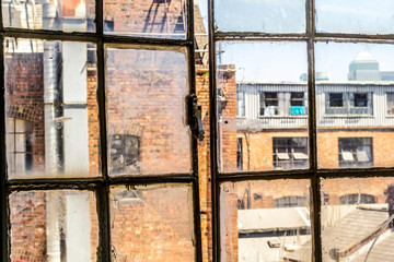 Old, rusty, open window in the old factory, UK