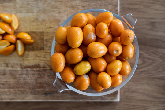 Bowl of kumquats on ktichen counter