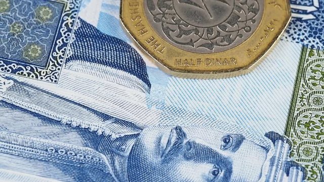 Jordan 10 dinar banknote and coin slow rotating. Jordanian money currency. Jordan economy. Stock video footage