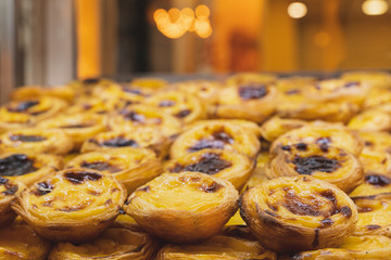 Pastel de Nata, Portuguese custard tart, egg with cinnamon.
