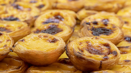 Pastel de Nata, Portuguese custard tart, egg with cinnamon.