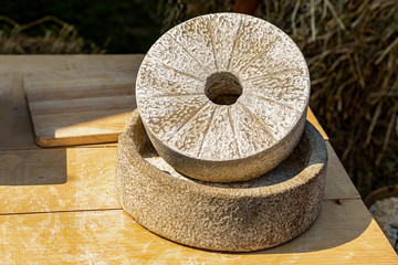 millstone stone grain grinding flour production handmade traditional way with antiquity