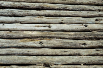 parallel horizontal gray log old weathered wall surface knot crack wall design rustic
