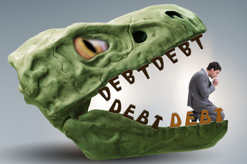 Businessman in the jaws of debt and loan