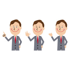 ポップな中年のグレーのスーツのビジネスマン　3ポーズ１