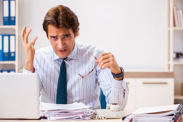 Businessman disgusted with cockroaches in the office