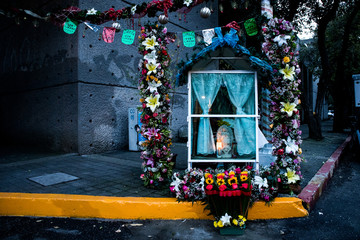 Fototapeta na wymiar Altar Decorated for Holiday (Dia de la Virgen Guadalupe) in Mexico City