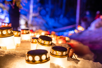 Burning Candles in White Colors with Shallow Depth of Field With Blue Background and Space For Text - 02.02.2019 event 
