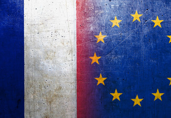 France and European Union flags on the grunge metal background