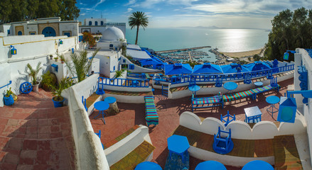 Fototapeta na wymiar Touristic picturesque village Sidi Bou Said. Famous cafe with beautiful view. Tunisia