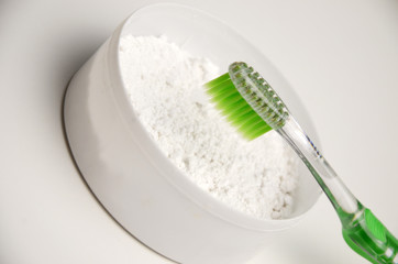 Toothbrush and tooth powder