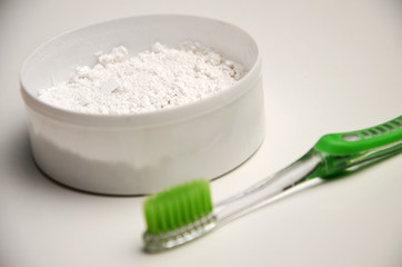 Toothbrush and tooth powder