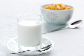 Cow's milk in a clear glass. Dietary nutritious healthy breakfast