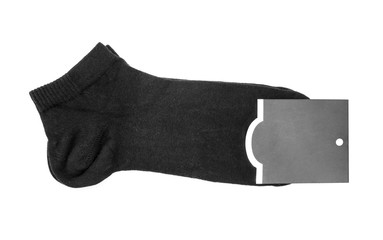 Black socks with tag on white background..