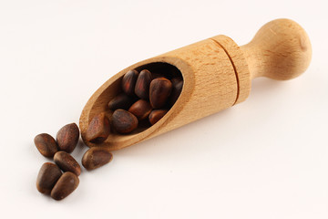 Pine nuts in a scoop